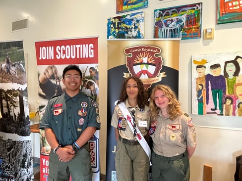 Scout standing at entrance at good Scout award dinner